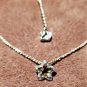 Gold Tone Swarovski Necklace With Crystal Encrusted Star Pendant